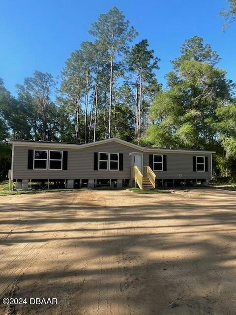 5003 OLIVE AVE, BUNNELL, FL 32110, photo 1 of 18