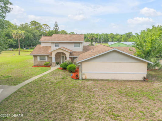 299 W HICKORY AVE, OAK HILL, FL 32759 - Image 1