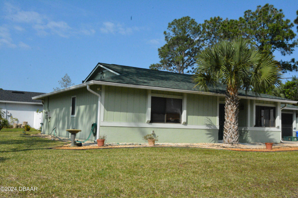121 POINT OF WOODS DR, PALM COAST, FL 32164, photo 1 of 23
