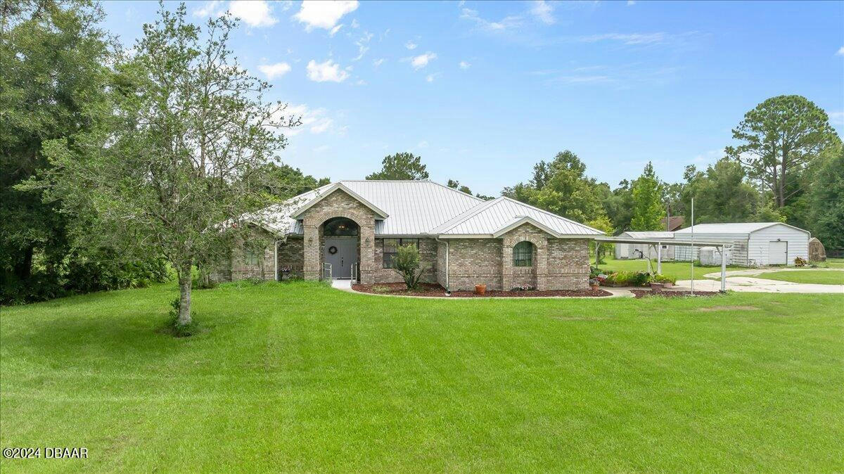 848 SAND CRANE LN, LAKE HELEN, FL 32744, photo 1 of 46